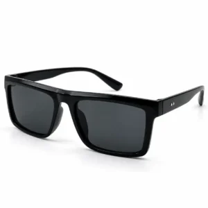 Angled view of high-shine glossy black rectangle sunglass with dark lenses and two silver dots on the temple.